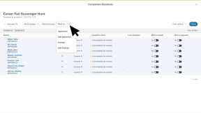 Educator account in Xello. A custom task report is open with the "In review" filter applied. The cursor has clicked the "Mark as..." dropdown showing the options to mark each student's work as "Approved", "Not approved", "Exempt", or "Not exempt"